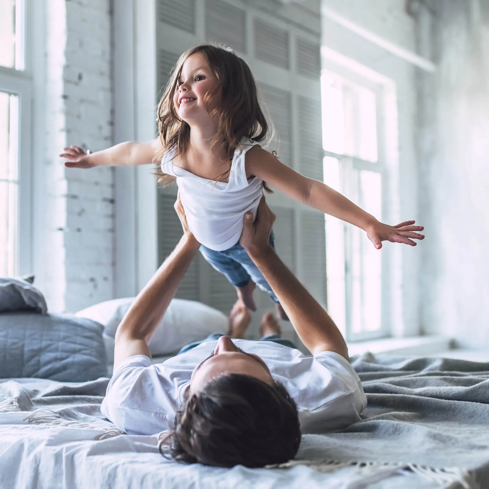 Dad and Child Playing | Terry's Floor Fashions